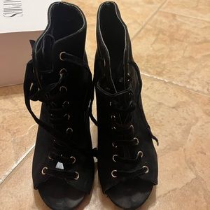 Black lace up heels.